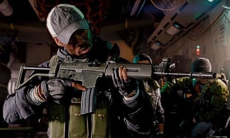 cold war operator checking gear